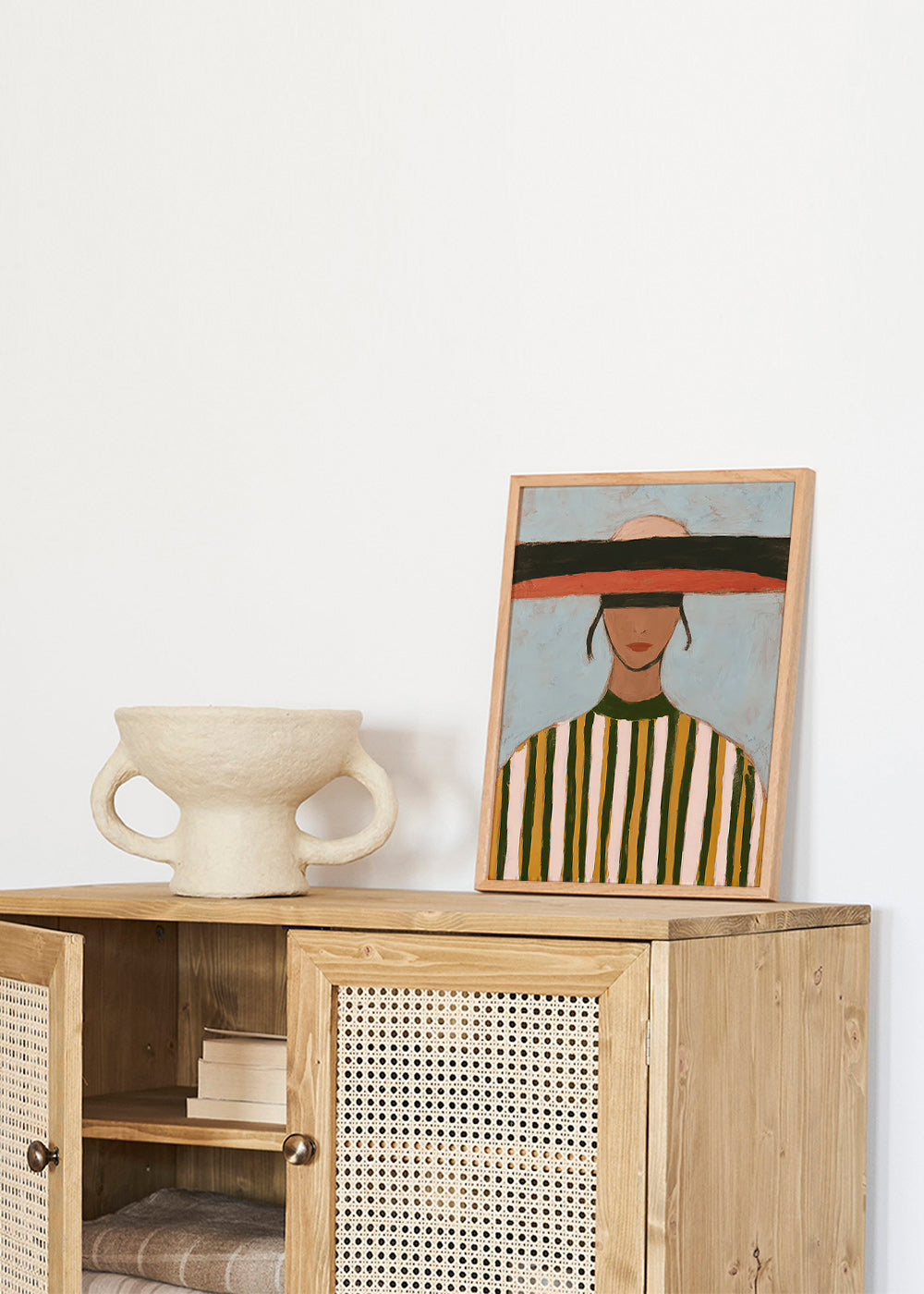 Illustration af figur med bred hat